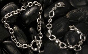 Robert Lee Morris bracelets on black stones