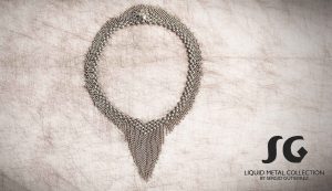 Silver Necklace on textured background